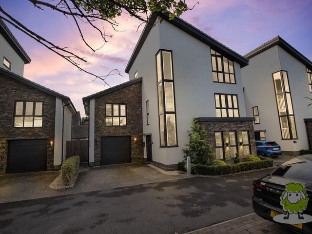 As we say farewell to the Bloomsbury Gardens house, here's an arty shot of the front of the house as evening draws in. It shows the driveway and the garage with its electric door.
