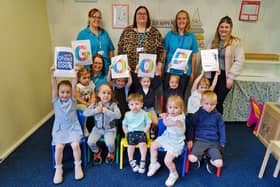 Staff and children at Sutton Centre Under Fives celebrate its good Ofsted rating.