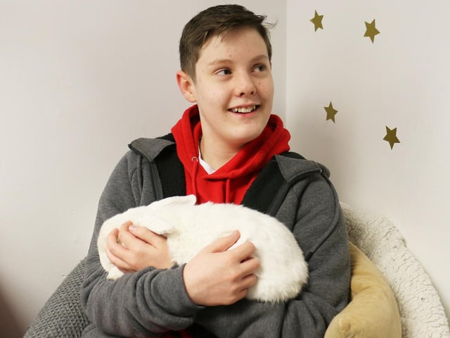 Twelve-year-old Brandon Hopkins visited with his brother Samuel who works at the college