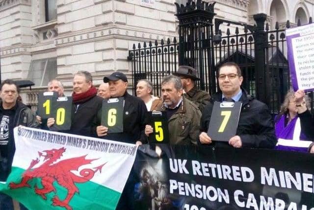 Former mineworkers campaigning for a fairer pensions deal outside Downing Street