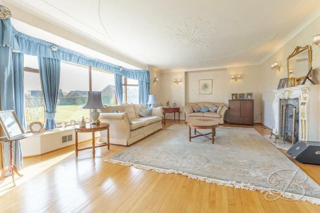 Let's begin our tour of the Kirkby property in this magnificent lounge, which is the main reception room. It is blessed with a superb amount of space for furnishings and homely touches, and with a wealth of natural light.,