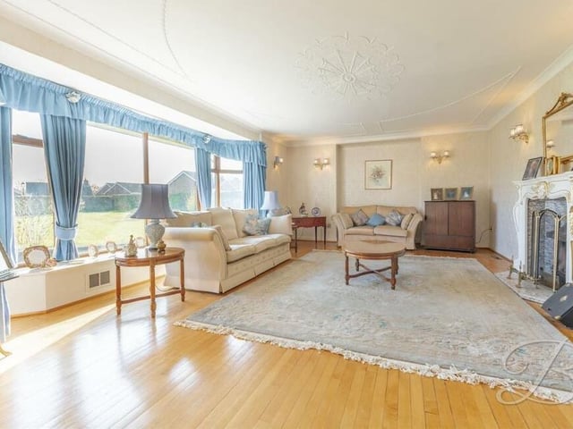 Let's begin our tour of the Kirkby property in this magnificent lounge, which is the main reception room. It is blessed with a superb amount of space for furnishings and homely touches, and with a wealth of natural light.,