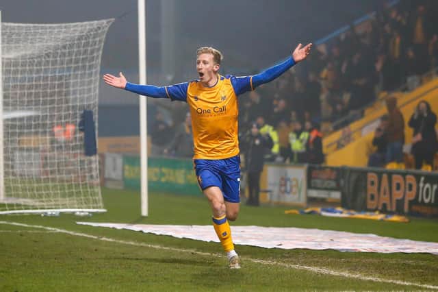 Harry Charsley celebrates scoring against Walsall.