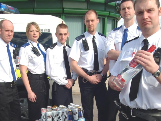 Selston Police seized large amounts of alcohol from under age drinkers in 2007. Pictured is Sgt Dean Greaves, right, and his officers, from the left; PCSO Tom Ford, PCSO Niki Wood, PC Jon Coulson, PC Mark Rainford and PCSO Darren Kenworthy.