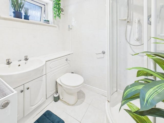 One of the stunning shower rooms with modern decor and high end fixtures and fittings