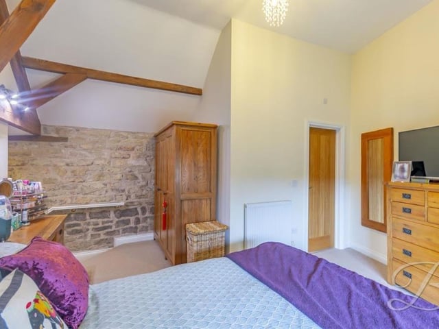 The master bedroom at the Sookholme barn conversion from a different angle. There is lots of storage space.