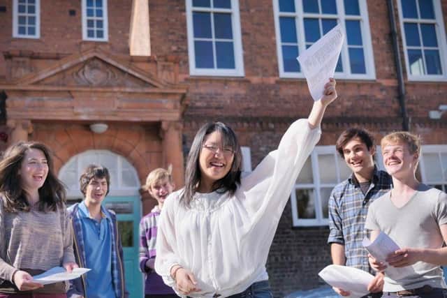 Students celebrating exam results
