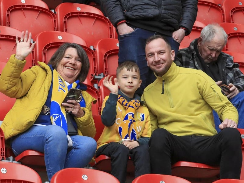 Mansfield Town battled back for a point at Rotherham to edge closer to survival.