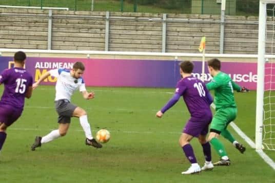 Gaz Curtis grabs Sherwood's late winner at Loughborough.