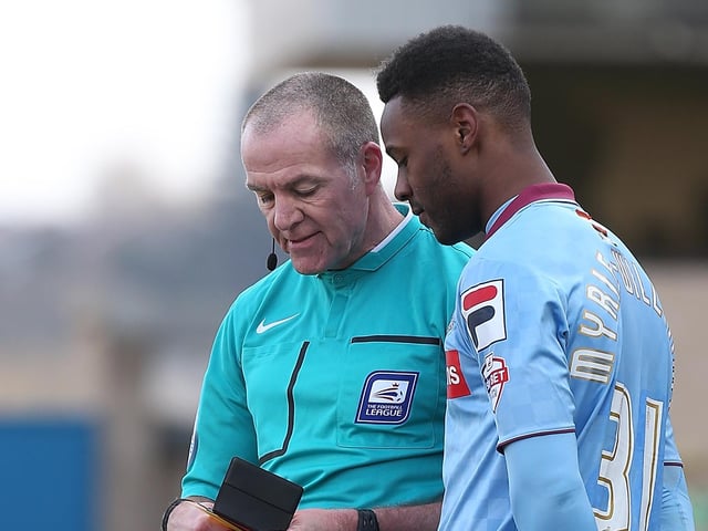 Referee Graham Salisbury takes the name of Jennison Myrie-Williams of Tranmere Rovers.