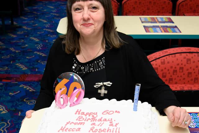 Mecca Rosehill gave Yvette a cake to mark her 60th birthday.