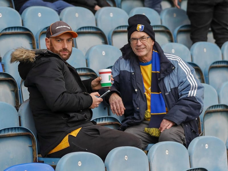 Mansfield Town fans watch the brilliant win at Peterborough United.