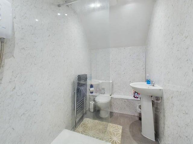 The second of the contemporary bathrooms upstairs.