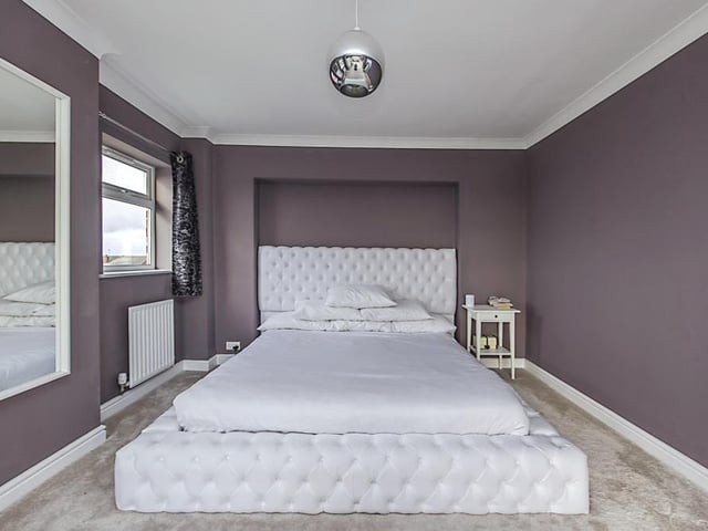 A bed fit for a king in the master bedroom, which offers superb views over neighbouring fields.