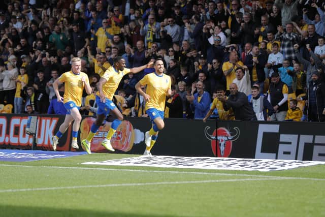 Lee Gregory celebrates his brilliant winner.