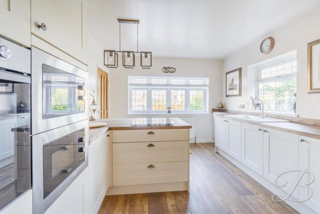 The superb kitchen has been recently fitted and features an extensive range of excellent shaker-style wall and base units, along with fantastic integrated appliances.