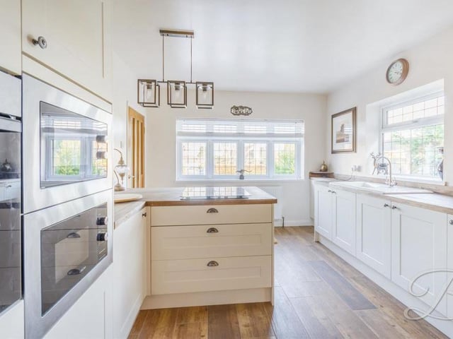 The superb kitchen has been recently fitted and features an extensive range of excellent shaker-style wall and base units, along with fantastic integrated appliances.