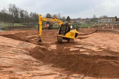 Work on the creation of a detention basin to reduce flooding in Mansfield.