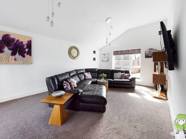 One of the highlights of the house is this lounge on the first floor. It is an outstanding size, with its dual aspect windows. An ideal room for family gatherings.