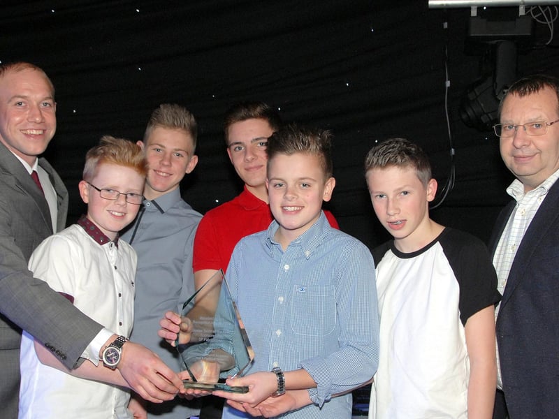 Samworth Church Academy Year 8 Football Team win the Junior Team of the Year at the Mansfield Sports Recognition Awards 2014. Steve Addlington, right, of SP Fabrications pictured with members of the winning team. Left to right Steve Thompson, teacher, Louis Turner, Jack Weatherer, Joe O'Neill, George Leeson, Captain and Dylan Tewson