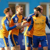 Stags celebrate defender Stephen McLaughlin's first half goal in Saturday's 3-1 victory at Barrow. Photo by: Chris Holloway/The Bigger Picture.media.