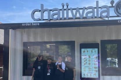 Staff outside the new Chaiiwala café at Tibshelf Services.
