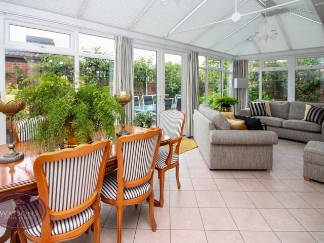 A bright and spacious conservatory is one of the property's assets, given that it could be used as a living room and dining room too. French doors lead to the back garden.