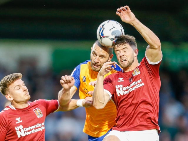 Midfielder John-Joe O'Toole in aerial action.