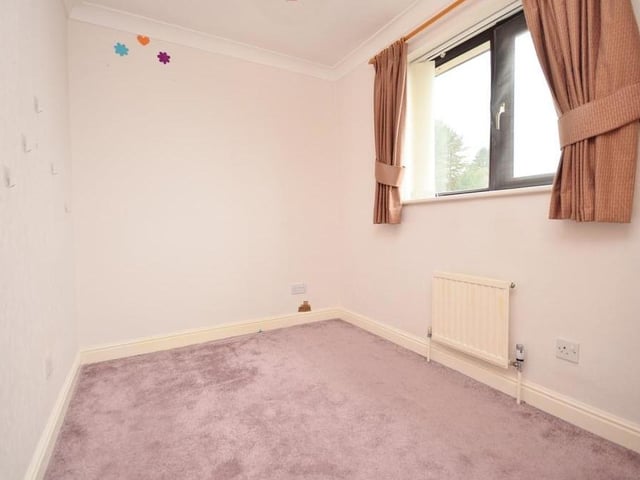 Bedroom number four is neat and compact. It overlooks the front of the Ravenshead property.