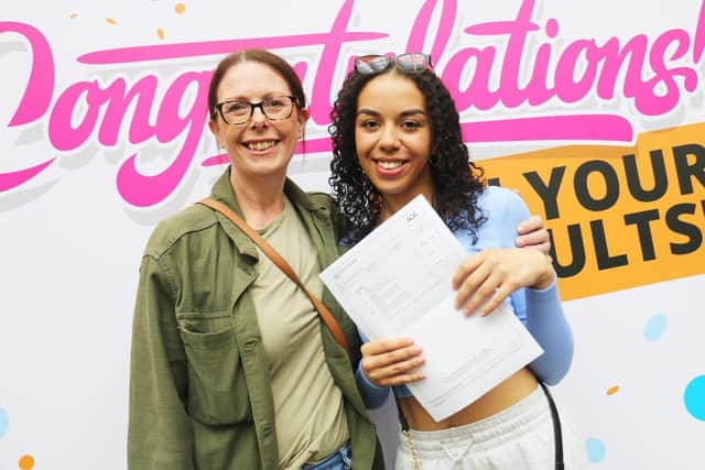 Mya Williams celebrates her two A grades and two B grades with her proud mum Sarah Sedgwick (left).