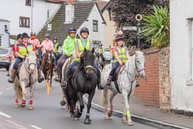 Sarah Howarth, on her 13-year-old Dales cross horse, Bella, and nine-year-old daughter Phoenix, aboard 20-year-old pony, Dotty, at the head of the awareness ride as it wends its way through Blidworth. (PHOTO: Epona Photography)
