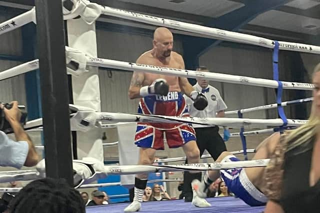 Ward in ring action.