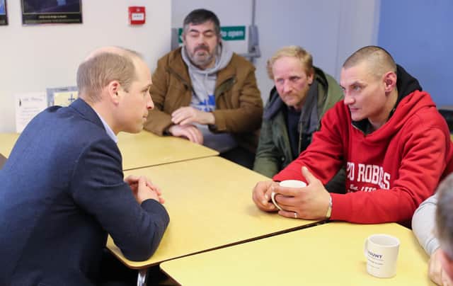 MANSFIELD, ENGLAND - FEBRUARY 26: Prince William, Duke of Cambridge (L) speaks with service users during a visit to The Beacon, a day centre which gives support to the homeless and vulnerable people on February 26, 2020 in Mansfield, England. (Photo by Chris Jackson - WPA Pool/Getty Images)