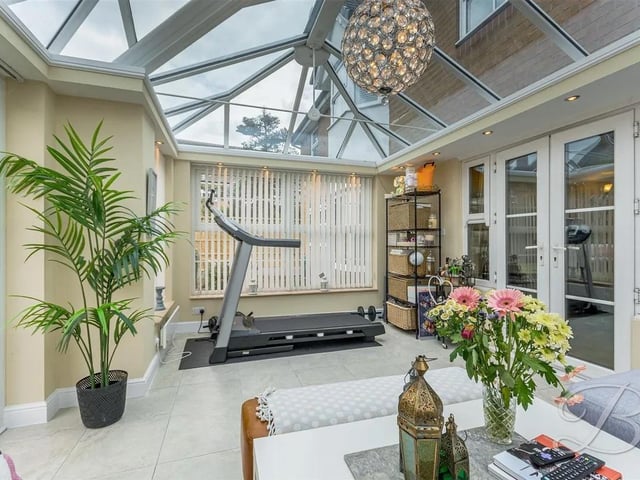 The light and bright garden room is the perfect place to relax and watch the seasons change.