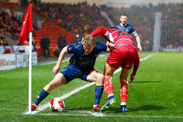 Stags in corner flag action during the Emirates FA Cup second round against Doncaster Rovers at the Keepmoat Stadium.