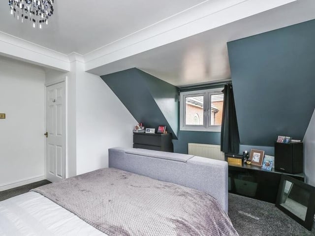 Like all the rooms in the Selston house, this bedroom is immaculately presented. It boasts a carpeted floor and windows to the side and back.