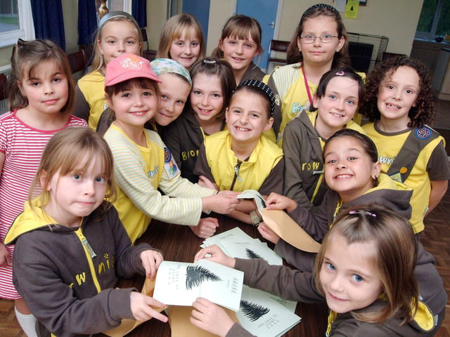 Members of the 14th Mansfield St. Augustines Brownies get stuck into their mailing duties with the Tree of Light leaflets back in 2008