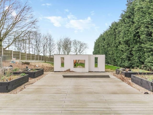 Here's a close-up of the large, decked patio area in the back garden. An ideal space for alfresco entertaining during the summer.