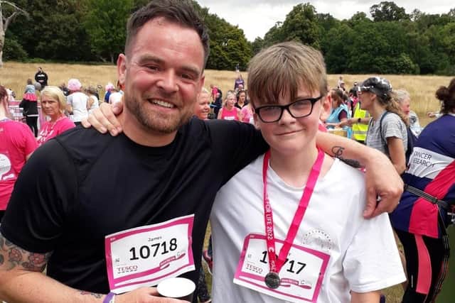 Finlay, with his dad, James Brown, after participating in the race for life.
