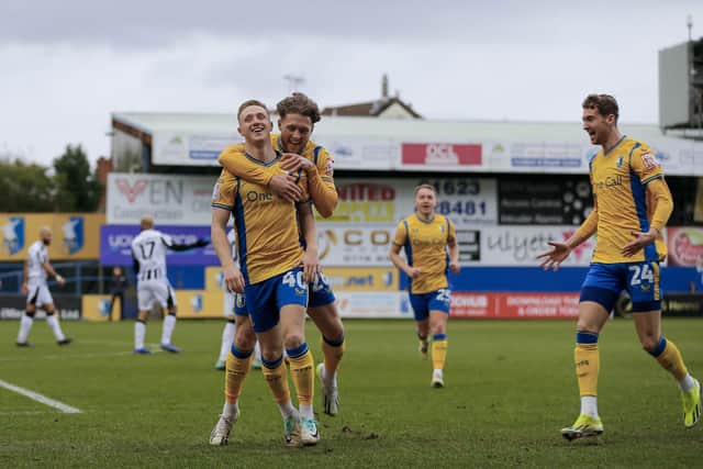 Stags congratulate Davis Keillor-Dunn on his matchwinner against Notts County.  Photo by Chris & Jeanette Holloway/The Bigger Picture.media