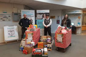 Gavin Etches, of Dodd Group Ltd, the Mayor of Broxtowe councillor Richard MacRae and Jessica Brannan, of Broxtowe Youth Homelessness, collected the donation items from the collection point.
