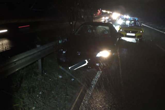 The car crashed into the barrier along the A38 near Alfreton yesterday.
