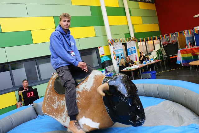 Plastering student Nathan Roe showed off his balance abilities on the rodeo bull