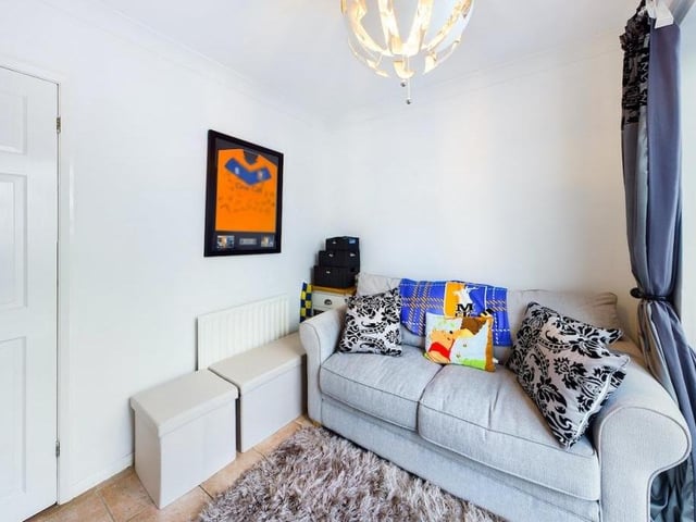 The second bedroom is currently being utilised as a second reception room.