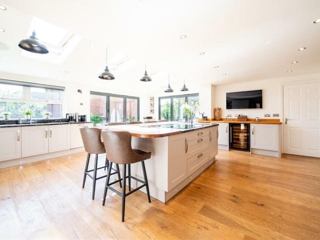 Let'; begin our tour of the £425,000 Mansfield Woodhouse home in the modern and spacious kitchen, which comes complete with a stunning island.