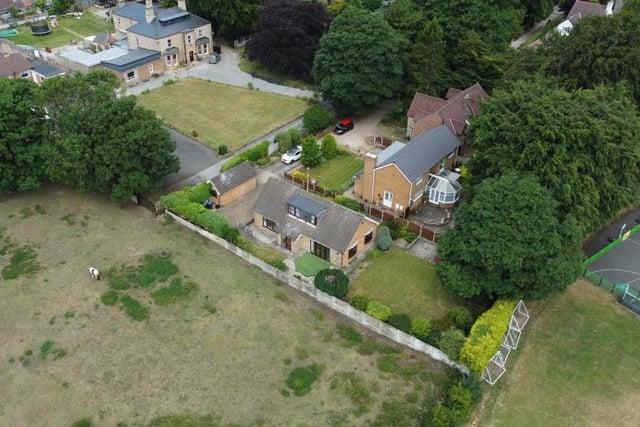 And finally......a revealing aerial shot of the £375,000 bungalow on Kirkby House Drive, giving you a good idea of how it sits in the surrounding landscape.