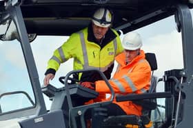 In February, Prince William, the Duke of Cambridge visited Tarmac's national skills and safety park in Nether Langwith to officially open the centre. He is seen, seated, being shown how to use a paver machine by Chris Hill.