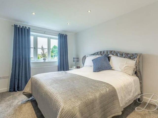 All five bedrooms at the Derby Road house are generously-sized, offering space and flexibility. This one has fitted carpets and downlights.