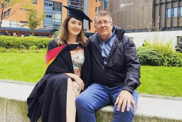 Mick Bradley with his daughter Megan at her graduation in September 2021.