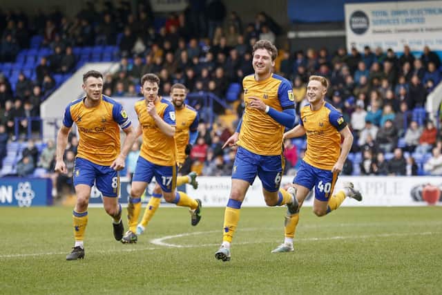 Mansfield Town defender Riley Harbottle celebrates his first half goal during the Sky Bet League 2 match against Tranmere Rovers FC at Prenton Park, 18 Feb 2023
Photo credit : Chris Holloway / The Bigger Picture.media